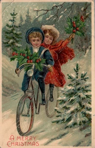 CHRISTMAS POSTCARD BOY & GIRL ON BICYCLE FOR TWO BRING HOLLY - Picture 1 of 2