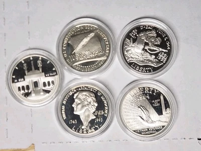 Lot Of 5 US COMMEMORATIVE SILVER DOLLARS1 90% SILVER BU COINS IN CAPSULES. - Image 1 of 4