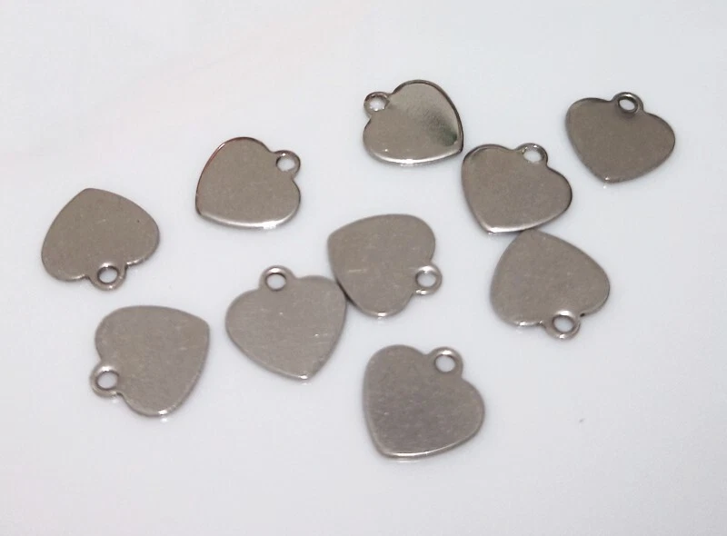10pz ciondoli mini cuore in acciaio inox 9,5x1mm colore argento scuro - Immagine 1 di 1
