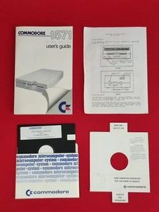 COMMODORE 1571 DISK DRIVE MANUALE FLOPPY TEST DEMO RETROGAME RETRO COMPUTER CBM - Afbeelding 1 van 9