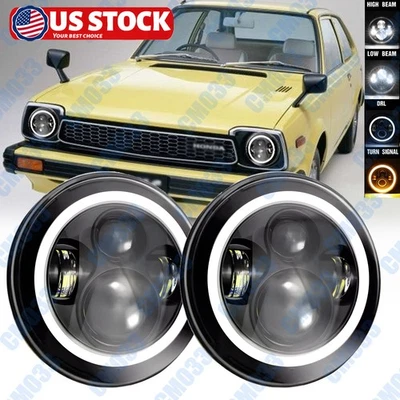 Par de faros LED redondos de 7 pulgadas para Toyota Corolla 1968-1979 halo DRL bombilla giratoria Foto 1 de 4