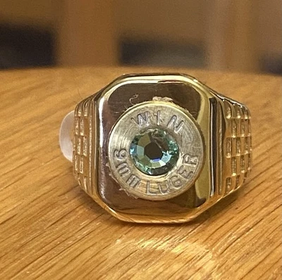 Anillo texturizado Winchester 9 mm Luger carcasa bala latón tamaño 6 con cristal verde Foto 1 de 4
