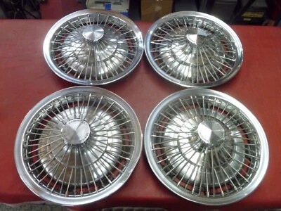 VINTAGE NOS 1970-76 CHEVY CHEVELLE NOVA SS WIRE HUBCAPS WHEEL COVERS - Image 1 of 4