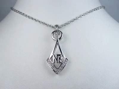 Colgante enchapado en rodio Nina Ricci - Cristales de Swarovski y logotipo sin precio base 16-18" - 8025 Foto 1 de 3