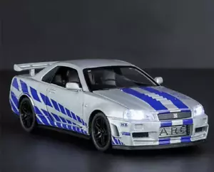 Modellino auto Nissan Skyline GTR R34 1/32 con luci e caratteristiche - Foto 1 di 6