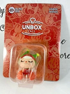 New Unbox Industries Greenie -with a red apron-super Cute Limited Edition- Last1 - Bild 1 von 4