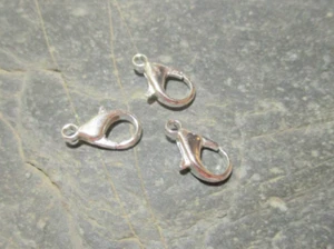 20 Karabiner Verschlüsse 12 x 6 mm Kettenverschluss Karabiner silberfarben - Bild 1 von 1