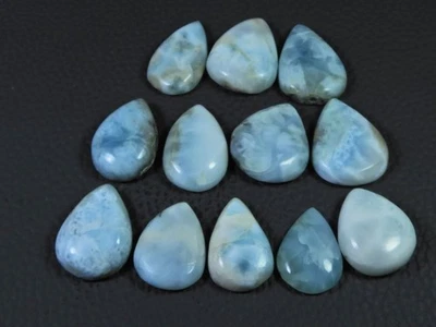Lote de 12 piezas de piedras preciosas sueltas de pectolita natural Larimar pera cabujón 159 quilates. Foto 1 de 4