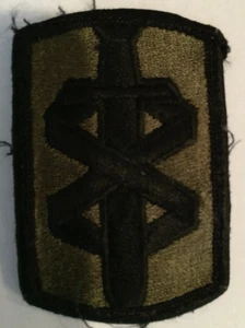 Vietnam Era U.S. Army 18th Medical Brigade Subdued Merrow Edge Patch #208 - Bild 1 von 1