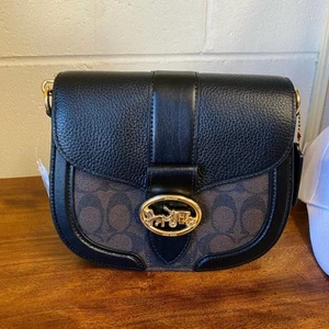 Coach C2806 Georgie Saddle Bag In Signature Canvas Brown/Black - Picture 1 of 8