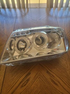 1999 to 2004 Jeep Grand Cherokee Drivers Side Halogen Head Lamp Replacement/Led - Picture 1 of 2