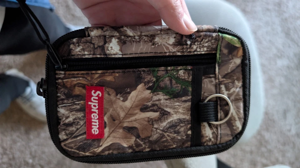 Cartera Supreme para hombre (pequeña bolsa con cremallera) Foto 1 de 3