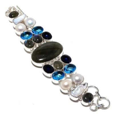 Brazalete de plata de ley 925 con piedras preciosas de topacio azul y032 Foto 1 de 4