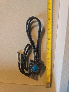 Embossed Silver Color Thunderbird Phoenix with Oval Turquoise Stone Bolo Tie - Picture 1 of 3