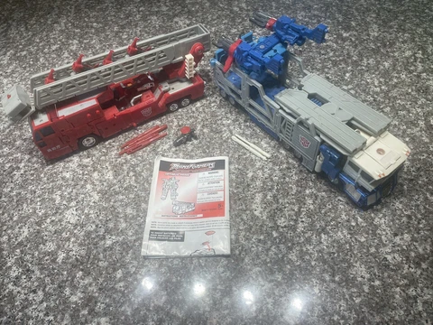 Optimus Prime and Ultra Magnus Omega Prime - Transformers RID Complete! Cover