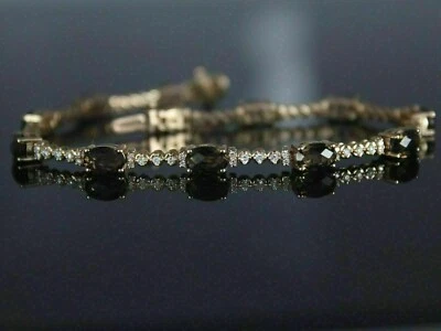 Brazalete de tenis de oro amarillo de 14 quilates con diamantes marrones de corte ovalado de 10 quilates Foto 1 de 4