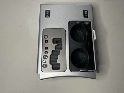 Nissan Armada Titan 2004-2007 consola central palanca de cambios portavasos bisel OEM Foto 1 de 4