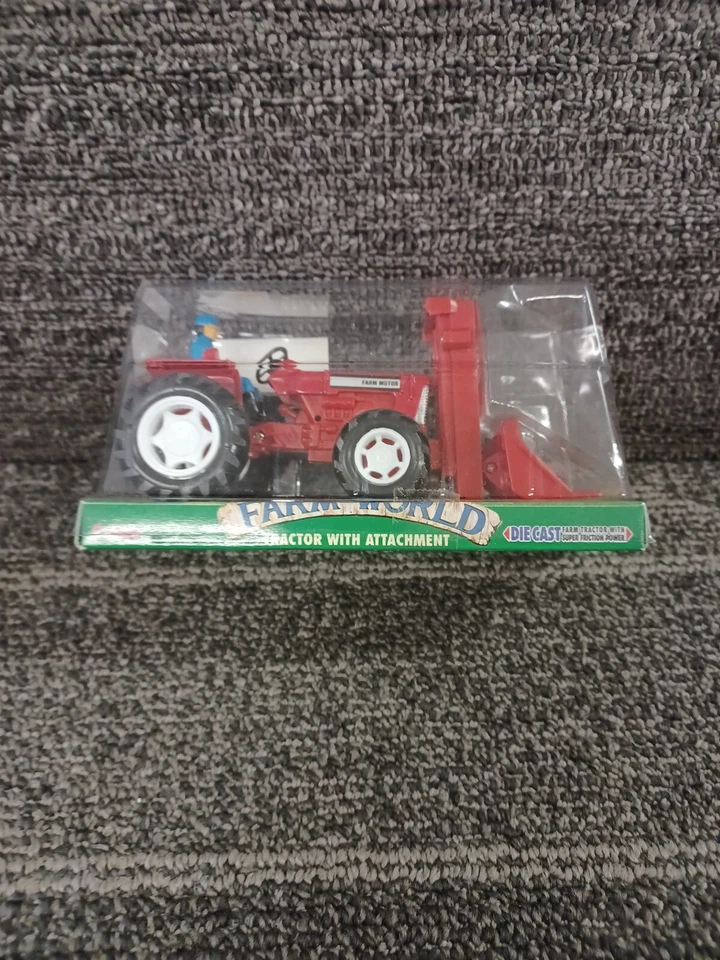1:43rd Scale Red Tractor With Attachment Diecast By Baley - Image 1 of 1