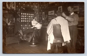Vintage RPPC Argonia KS Interior of Barber Shop Shaving Mugs Chairs Mirror T36 - Picture 1 of 2
