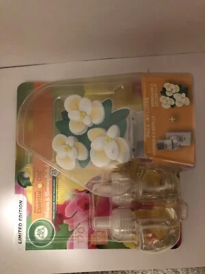 Calentador de aceites esenciales AirWick para orquídeas en flor de hibisco 2 recambios clip de decoración Foto 1 de 4