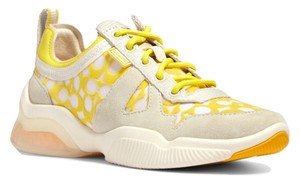 yellow coach shoes