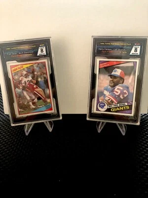 1984 TOPPS FOOTBALL CELLO PACK SMC 8 NRMT-MT  HARRY CARSON-CLIFF BRANCH  #1304 - Image 1 of 3