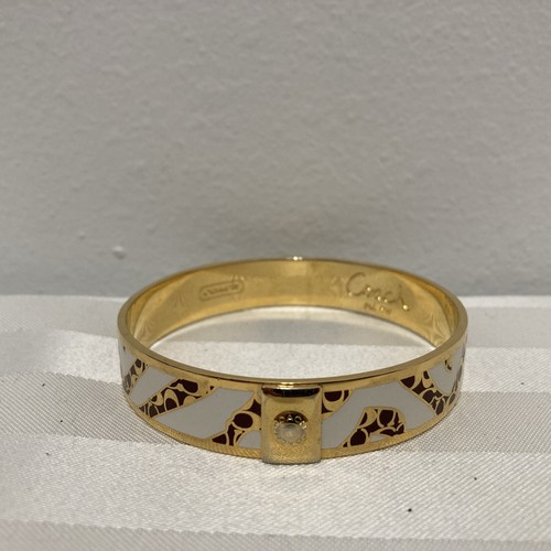 Bracciale Coach firmato tono oro righe bianco con logo donna