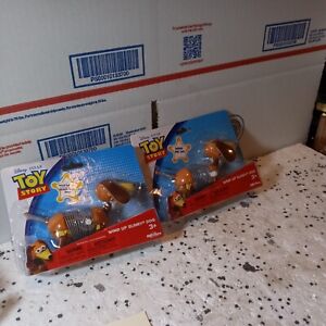 Disney Pixar Toy Story Wind-Up Slinky Dog New 2012 lot of two great items