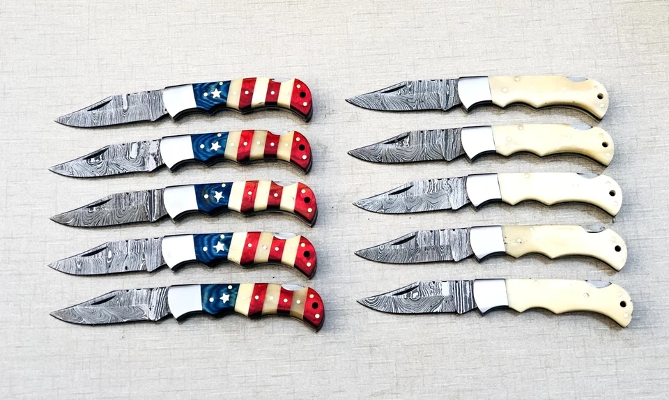 JUEGO DE 20 NAVAJAS DE BOLSILLO, BANDERA AMERICANA Y MANGO CAMELLO B CON FUNDA DE CUERO Foto 1 de 4