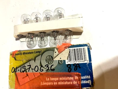 Paquete de 8 bombillas de señal de giro-base Eiko 2057 transparentes nuevas en caja Foto 1 de 3