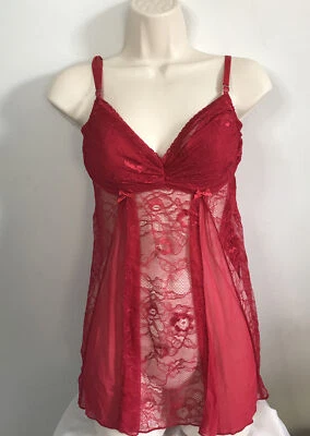 Muñeca bebé Fredericks of Hollywood roja brillante con cuerda G a juego mediana Foto 1 de 4