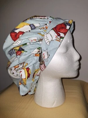 Snow People on Blue Medical Surgical Bouffant Scrub Hat SIZE LARGE - Image 1 of 2