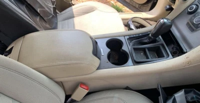 Ford Taurus 2013-2019 consola de piso central delantera bronceada sin cambio Foto 1 de 3