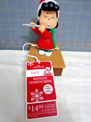 2011 Hallmark XKT1002 "Lucy" Peanuts Wireless Band - Image 1 of 3