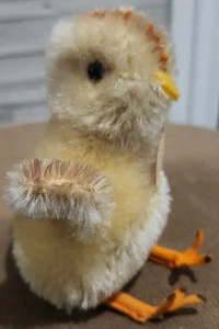 Flauschiges gelbes Küken mit Hangtag, Band und Ohrknopf Steiff 3310.01 - Bild 1 von 6