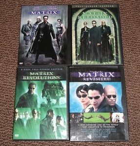 (4) Matrix Movie DVD Lot Reloaded Revolutions The Matrix Revisited - Picture 1 of 2
