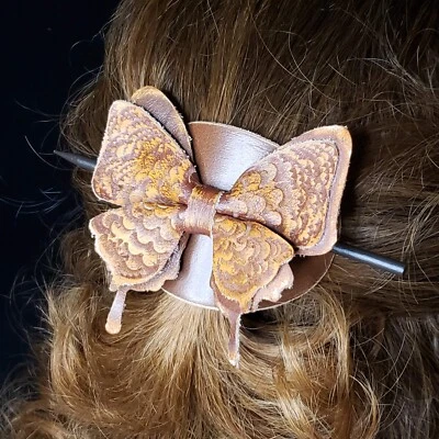 Cordón de pelo de cuero genuino marrón con palo Foto 1 de 4