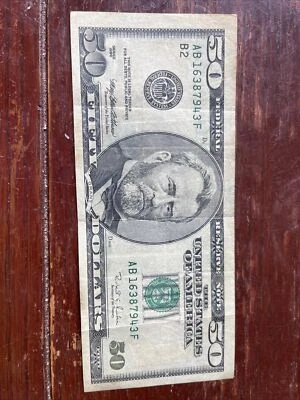 ONE FIFTY DOLLARS BILL 1996 ( D209 ) OF AMERICA TITLE (AB16387943F) VERY GOOD - Image 1 of 4