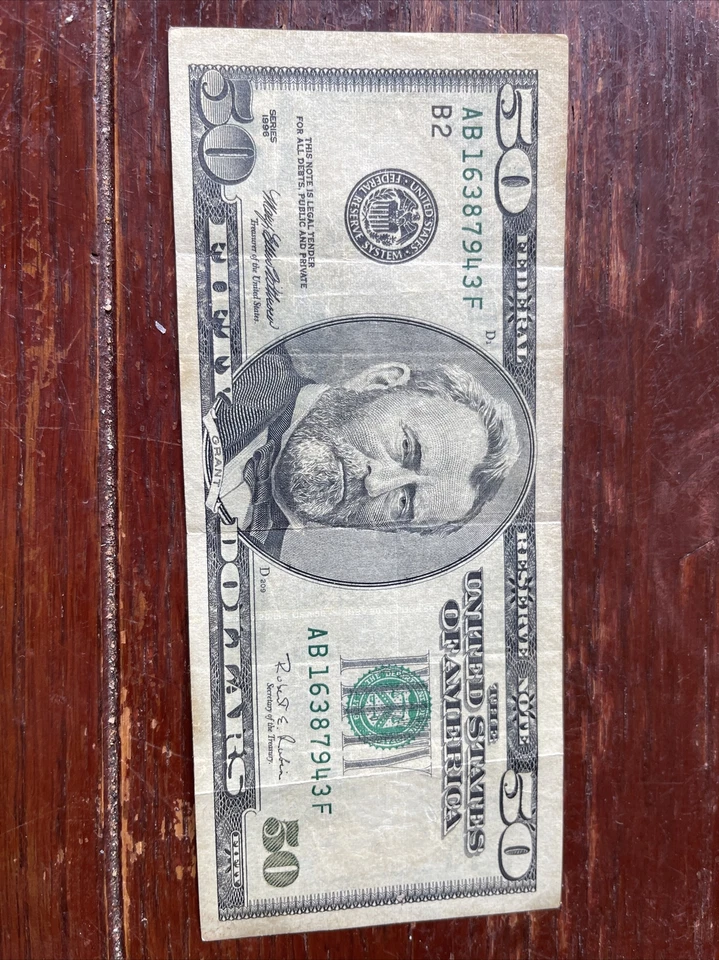 ONE FIFTY DOLLARS BILL 1996 ( D209 ) OF AMERICA TITLE (AB16387943F) VERY GOOD - Image 1 of 4