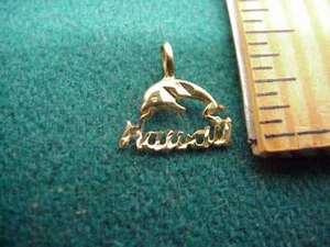Ciondolo Hawaii Delfino in oro giallo 14 KT usato - Foto 1 di 2