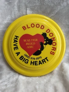 Frisbee — Blutspender haben ein großes Herz Vintage Kunststoff Flugscheibe gelb - Bild 1 von 3