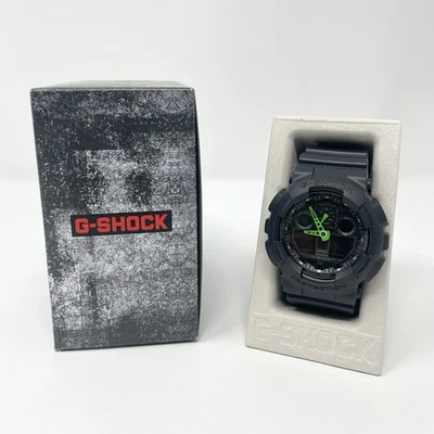 Reloj deportivo Casio G-Shock 200M para hombre con correa de resina negro/verde (GA-100C-1A3CR) Foto 1 de 4