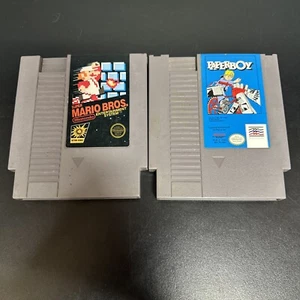 NES PAPERBOY TOY VIDEO GAME AND SUPER MARIO BROS CARTRIDGE. - Picture 1 of 6