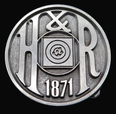 Fivela de cinto vintage Harrington & Richardson armas de fogo - Imagem 1 de 4