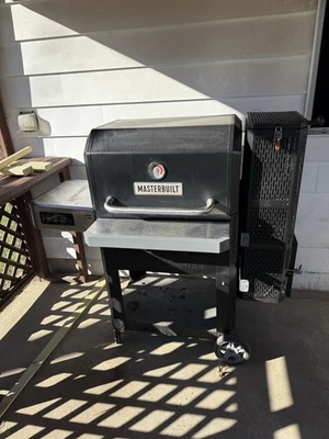 Parrilla de carbón digital Masterbuilt Gravity Series 1050 con ahumador - negra Foto 1 de 2