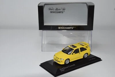 B25 1:43 MINICHAMPS 430 082105 FORD ESCORT COSWORTH 1992 GIALLO COME NUOVO - Immagine 1 di 4