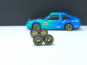 R343 Hot Wheels 1/64 Juego Donut 4 Radios 8mm Bronce, NEUMÁTICO DE GOMA MEDIANO JINETE REAL - Imagen 1 de 3