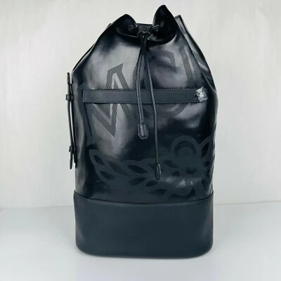 Mochila grande con cordón de lona recubierta negra $1120 MCM Tivitat MUK9ABT11BK001 Foto 1 de 4