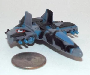 Small Micro Machine Zephyr T-90 Stealth Jet Fighter in blau/schwarz/grau Camouflage - Bild 1 von 5