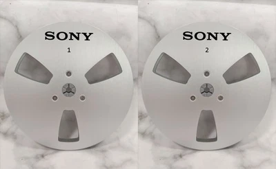 Un par de carretes de cinta Sony de 7"" de aluminio plateado para carrete a carrete vacío carrete de recogida Foto 1 de 4